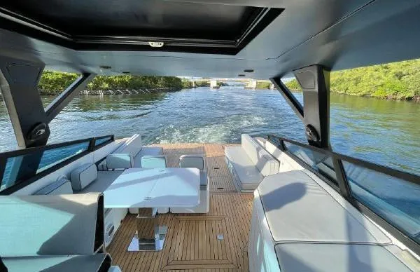 Slide: The Image of Evo Yachts 43 (2017) luxury yacht interior with scenic waterway view. - 8