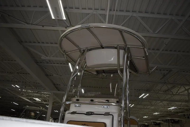 Slide: The Image of 2023 Sea Chaser 20 HFC boat with T-top in indoor showroom. - 12