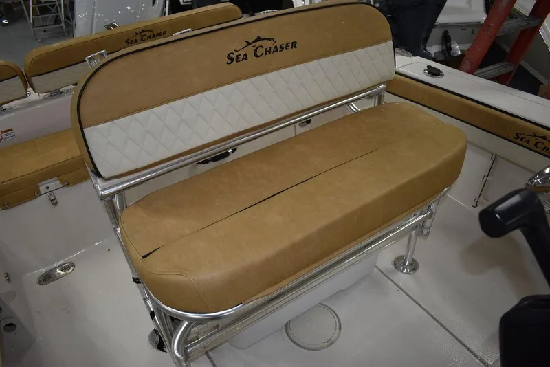 Slide: The Image of 2023 Sea Chaser 20 HFC boat seating with tan and white upholstery. - 25