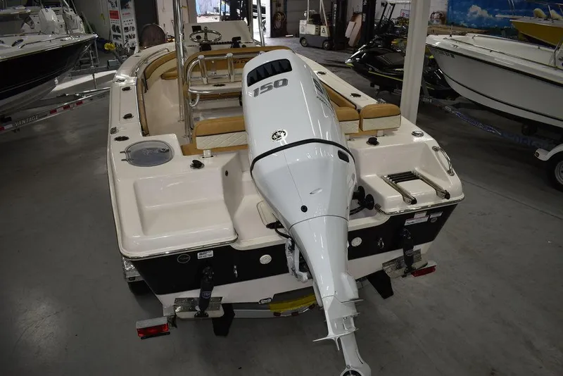 Slide: The Image of 2023 Sea Chaser 20 HFC boat with 150 HP outboard motor in showroom. - 3