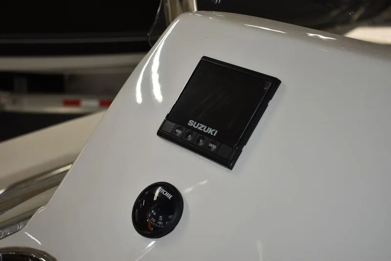 Slide: The Image of Close-up of 2023 Sea Chaser 20 HFC boat dashboard with Suzuki display. - 34