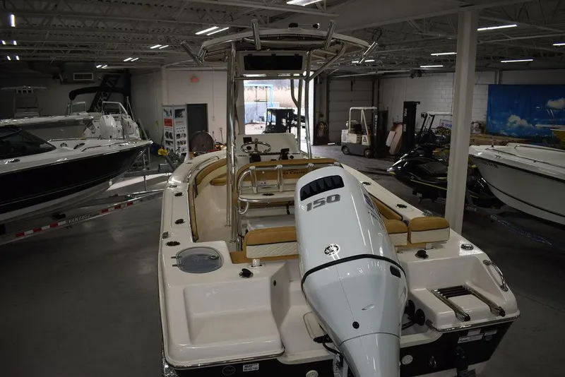 Slide: The Image of 2023 Sea Chaser 20 HFC boat with 150 HP engine in showroom. - 4