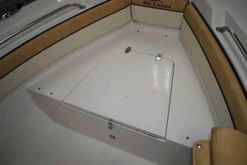 Slide: The Image of 2023 Sea Chaser 20 HFC boat interior storage compartment with cushioned seating. - 40