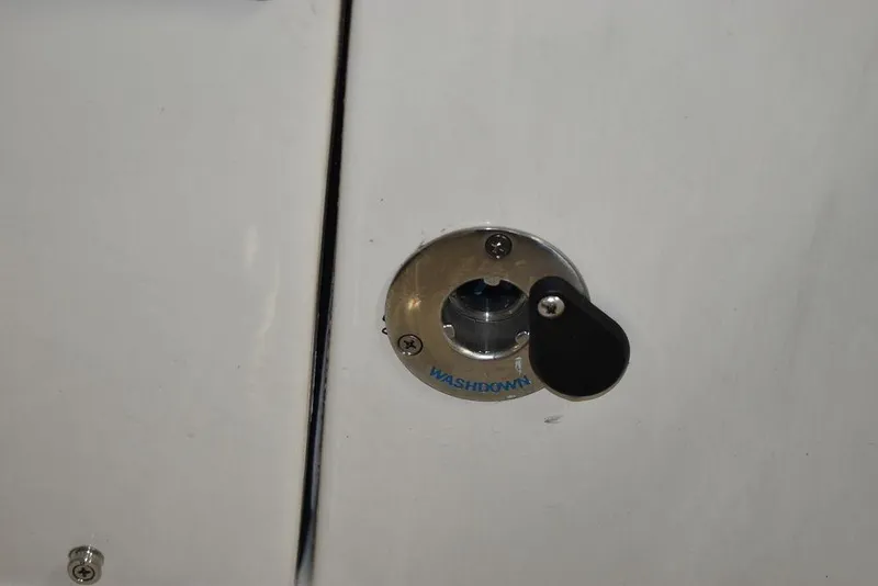 Slide: The Image of Close-up of a 2023 Sea Chaser 20 HFC boat's washdown fitting. - 49
