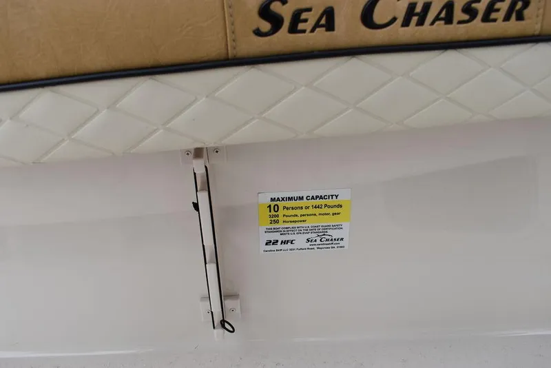 Slide: The Image of 2023 Sea Chaser 22 HFC boat, maximum capacity label for 10 persons or 1500 pounds. - 15