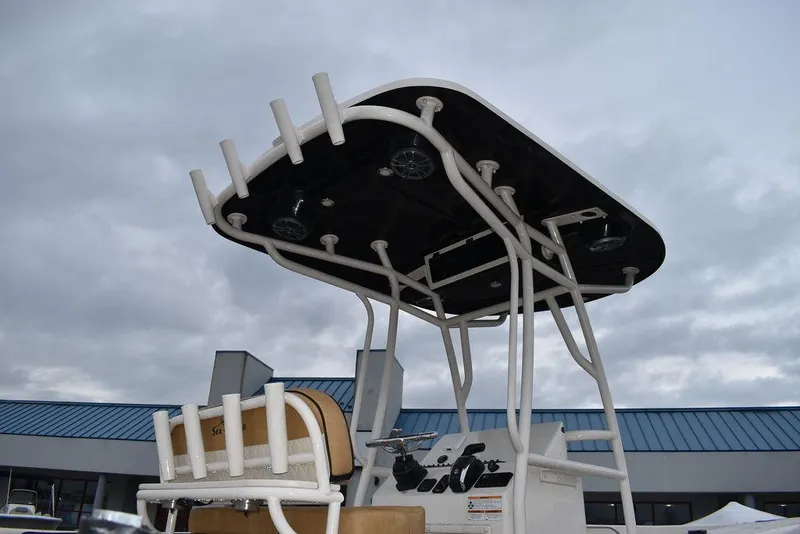 Slide: The Image of 2023 Sea Chaser 22 HFC boat with T-top and rod holders. - 3