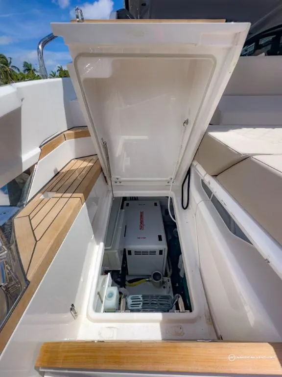 Slide: The Image of 2023 Fairline Targa 45 Open yacht storage compartment with generator. - 23