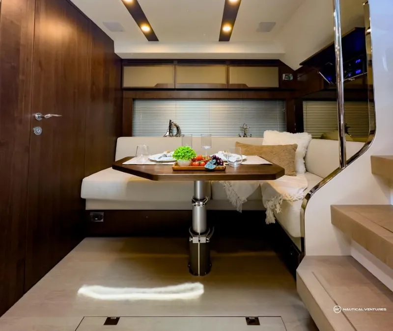 Slide: The Image of Luxurious interior of 2023 Fairline Targa 45 Open yacht with elegant dining area. - 27