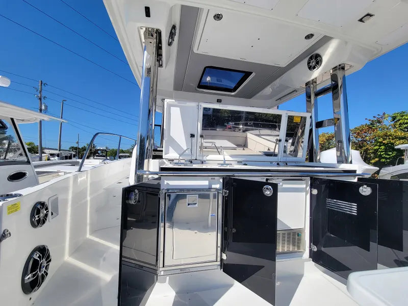 Slide: The Image of 2024 Jeanneau Leader 12.5 WA boat interior with modern amenities and sleek design. - 20