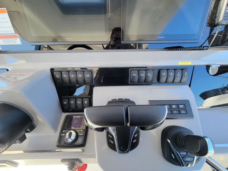 Slide: The Image of Control panel of the 2024 Jeanneau Leader 12.5 WA boat. - 28