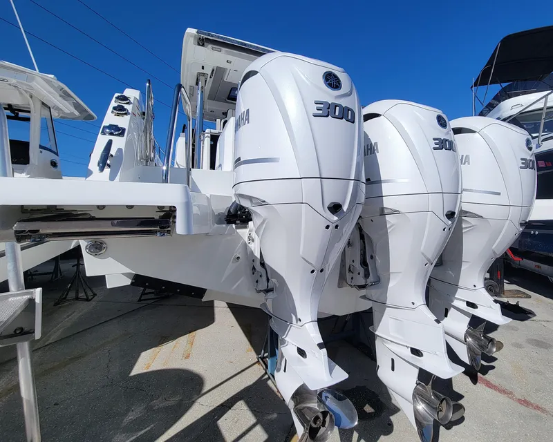 Slide: The Image of 2024 Jeanneau Leader 12.5 WA with triple Yamaha 300 outboard engines. - 3