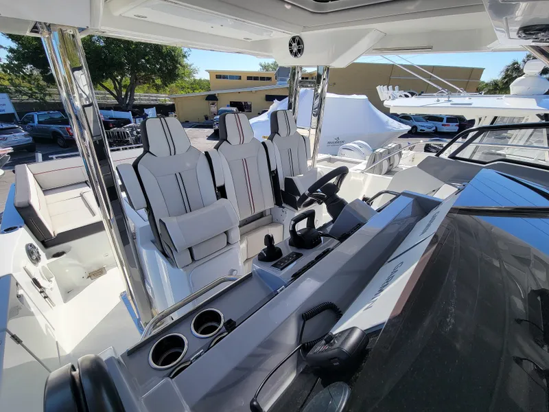 Slide: The Image of 2024 Jeanneau Leader 12.5 WA cockpit with modern seating and controls. - 31