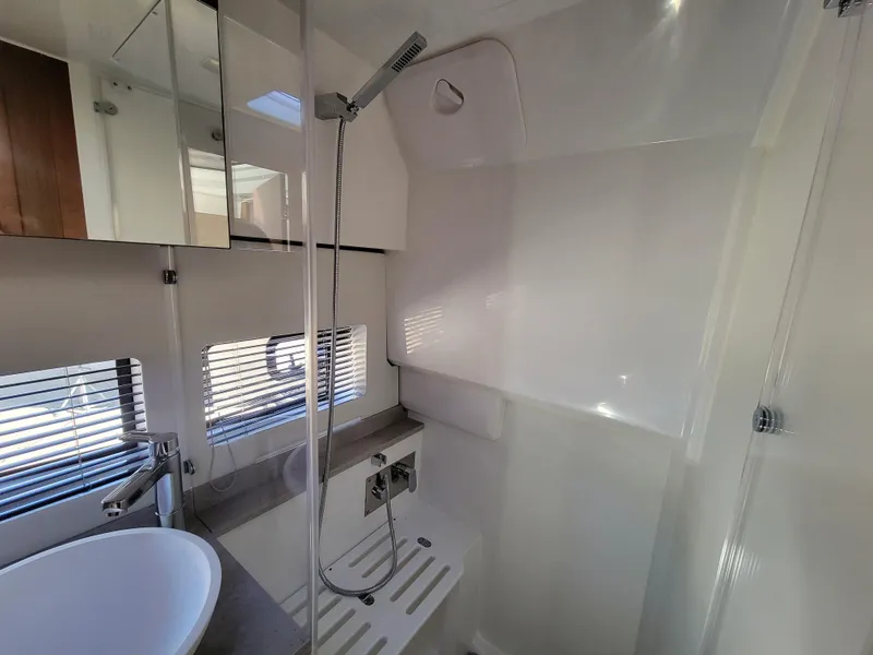 Slide: The Image of 2024 Jeanneau Leader 12.5 WA bathroom with modern fixtures and shower. - 49