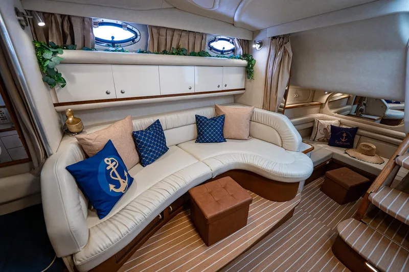 Slide: The Image of Luxurious interior of 1997 Sea Ray 330 Sundancer yacht with elegant seating and nautical decor. - 32
