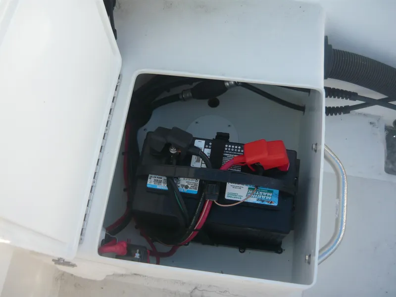 Slide: The Image of Battery compartment of a 2023 Parker 21 SE boat. - 9
