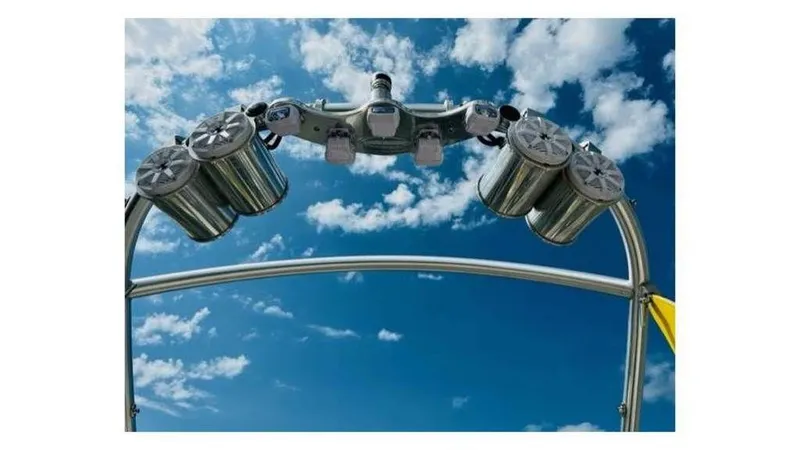 Slide: The Image of Speakers and lights on a 2006 Tigé 22VE/SK boat tower against a blue sky. - 11