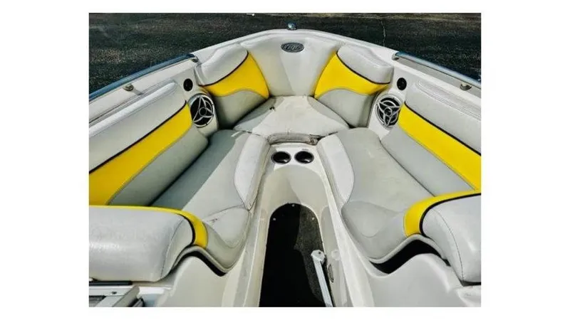 Slide: The Image of Interior seating of 2006 Tigé 22VE/SK boat with yellow and white upholstery. - 17