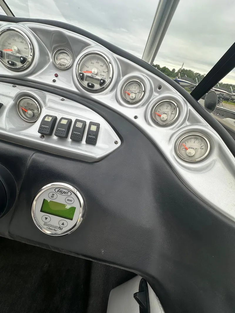Slide: The Image of Dashboard of 2006 Tigé 22VE/SK boat with gauges and controls. - 27