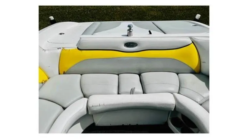 Slide: The Image of 2006 Tigé 22VE/SK STOCK#19026 boat interior with yellow and white seating. - 8