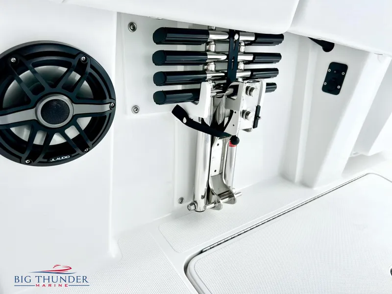 Slide: The Image of 2023 Fountain 38 TE boat interior with speaker and rod holders. - 13