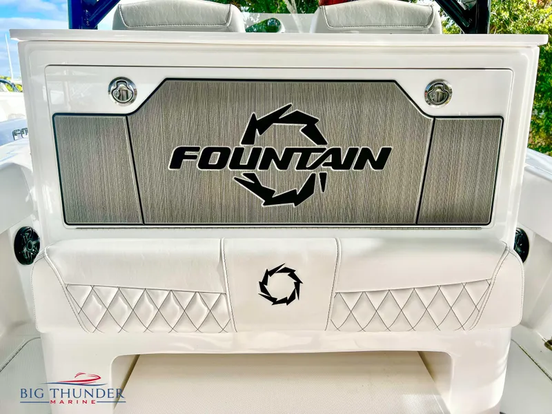 Slide: The Image of 2023 Fountain 38 TE boat interior with logo and Big Thunder Marine branding. - 14