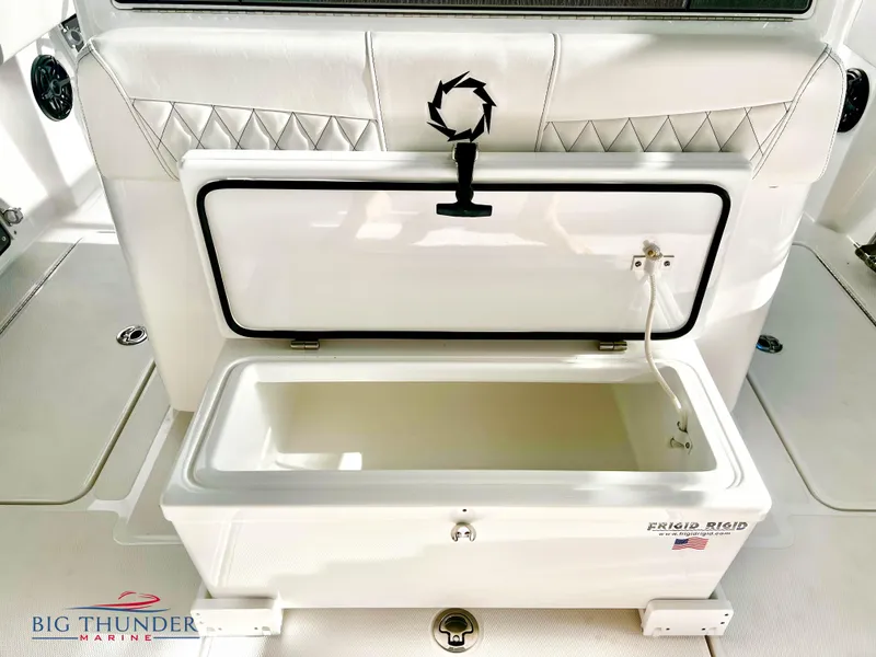 Slide: The Image of Open storage compartment on a 2023 Fountain 38 TE boat by Big Thunder Marine. - 17