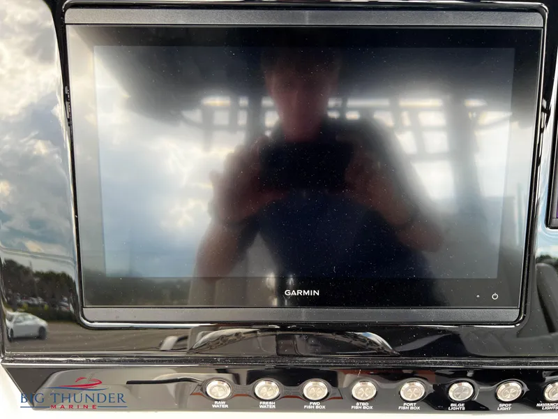 Slide: The Image of Garmin display on 2023 Fountain 38 TE boat dashboard at Big Thunder Marine. - 21