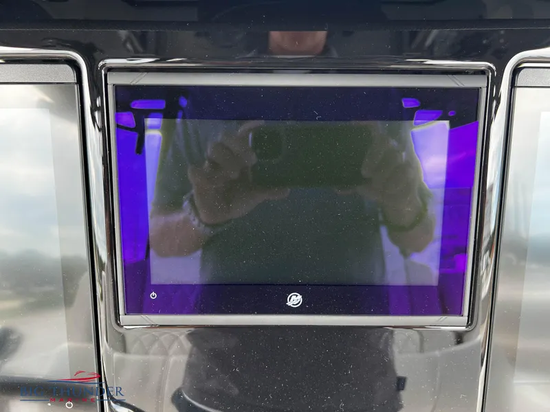 Slide: The Image of 2023 Fountain 38 TE boat dashboard with touchscreen display. - 22