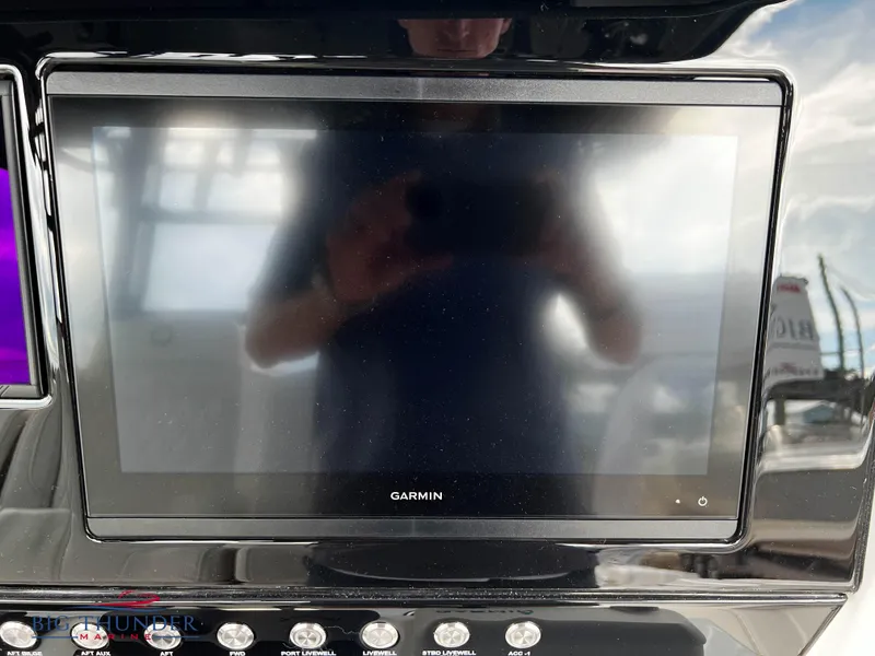 Slide: The Image of 2023 Fountain 38 TE boat with Garmin navigation display. - 23