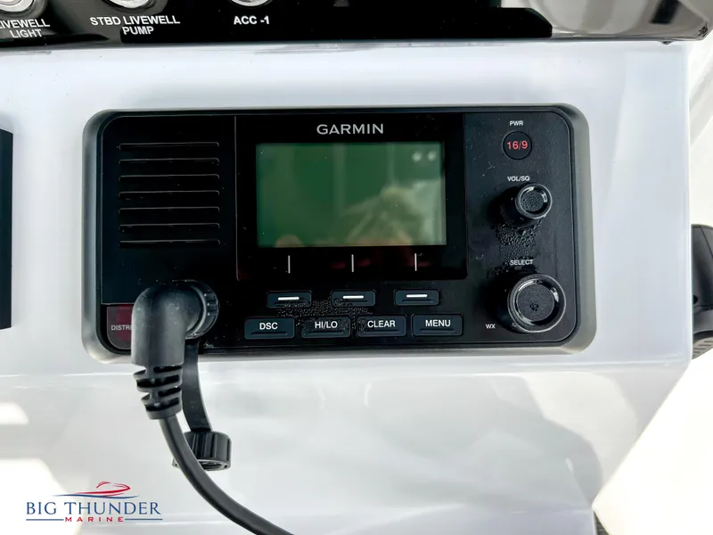 Slide: The Image of Garmin marine radio on 2023 Fountain 38 TE boat dashboard. - 24