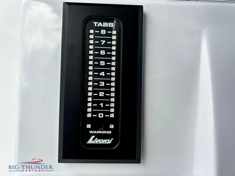 Slide: The Image of 2023 Fountain 38 TE trim tab indicator by Livorsi, Big Thunder Marine logo. - 32