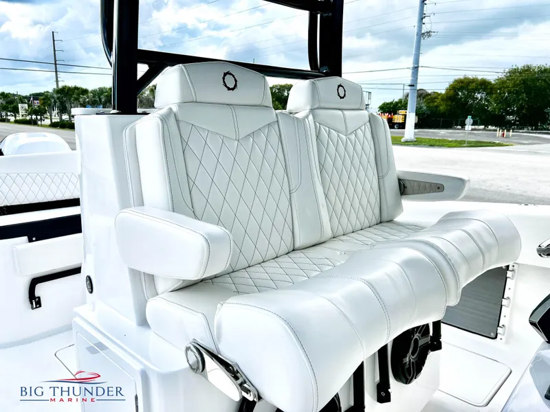Slide: The Image of 2023 Fountain 38 TE boat with luxurious white leather seating. - 34