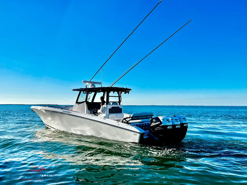 Slide: The Image of 2023 Fountain 38 TE boat on open water with fishing rods. - 4