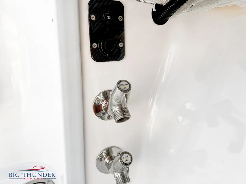 Slide: The Image of Fountain 38 TE 2023 boat water connections and control panel. - 40