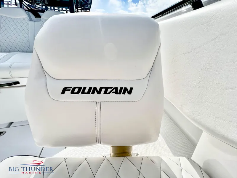 Slide: The Image of 2023 Fountain 38 TE boat seat with logo, white upholstery, Big Thunder Marine. - 48