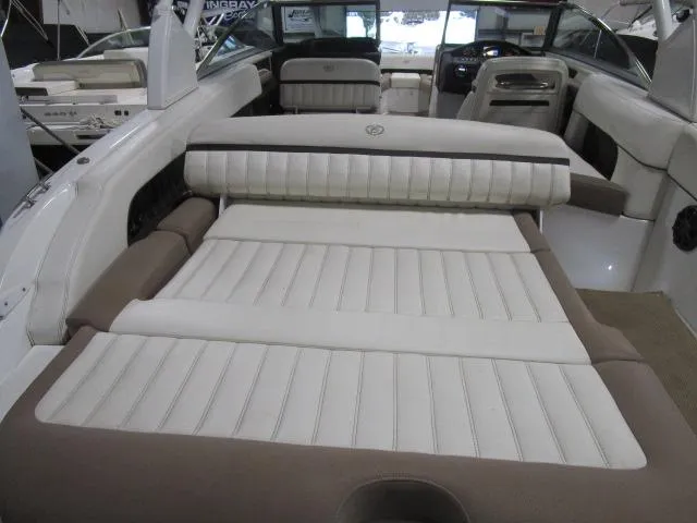 Slide: The Image of 2014 Cobalt 26 SD boat interior with spacious seating and modern design. - 15