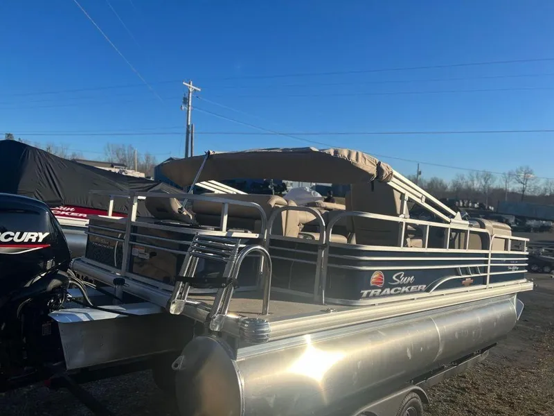 Slide: The Image of 2023 Sun Tracker FISHIN' BARGE® 20 DLX pontoon boat with Mercury outboard motor. - 5