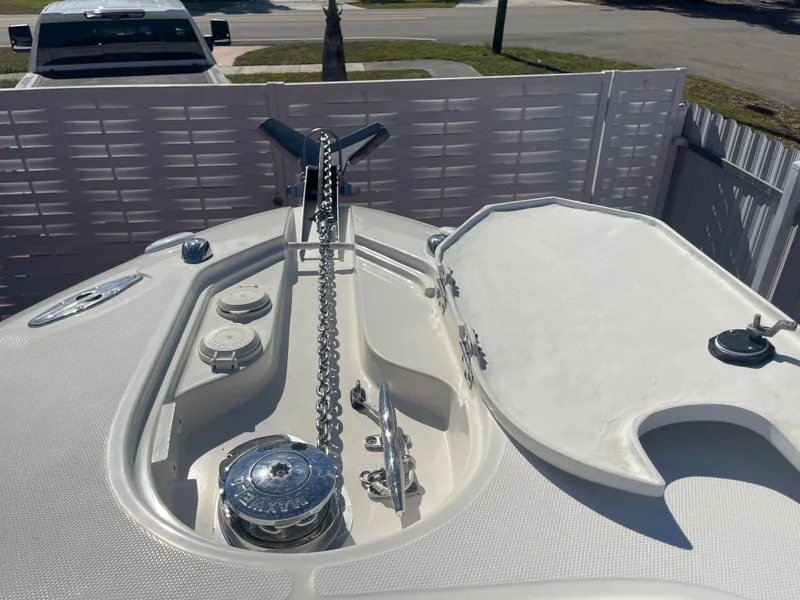 Slide: The Image of 2006 Wellcraft 310 CC boat anchor and chain compartment. - 20