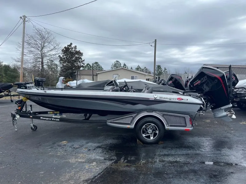 The Image of 2023 Ranger Z518 fishing boat on trailer in outdoor setting. - 0