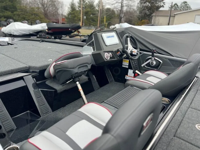 Slide: The Image of 2023 Ranger Z518 boat interior with modern dashboard and seating. - 5