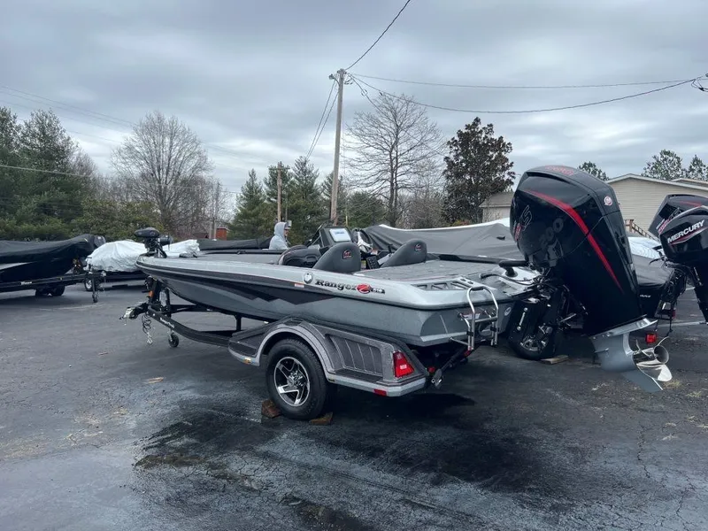 Slide: The Image of 2023 Ranger Z518 bass boat with outboard motor on trailer. - 8