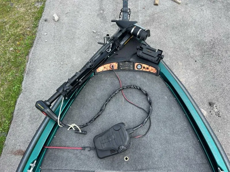 Slide: The Image of 1999 Sprint 286 Pro boat with fishing equipment on deck. - 8