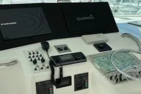 Slide: The Image of Control panel of a 2003 Cabo Express boat with Garmin and Furuno displays. - 6