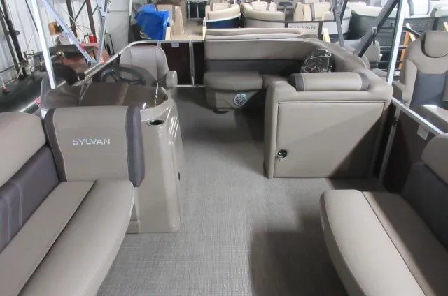 Slide: The Image of 2023 Sylvan 8520 Mirage Cruise interior, featuring spacious seating and modern design. - 1