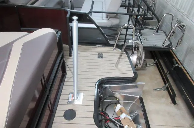 Slide: The Image of 2022 Sylvan L-1 Cruise boat interior with deck and seating area. - 7