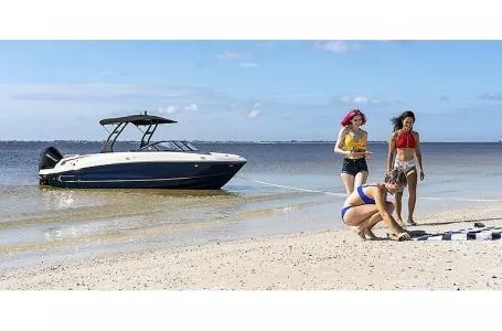 Slide: The Image of 2023 Bayliner VR6 Bowrider Outboard on beach with people enjoying - 5