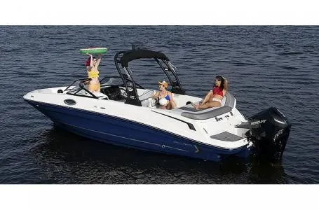 Slide: The Image of 2023 Bayliner VR6 Bowrider Outboard on water with passengers enjoying. - 9