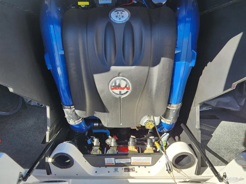 Slide: The Image of 2023 MasterCraft X26 engine compartment with Ilmor engine components. - 18