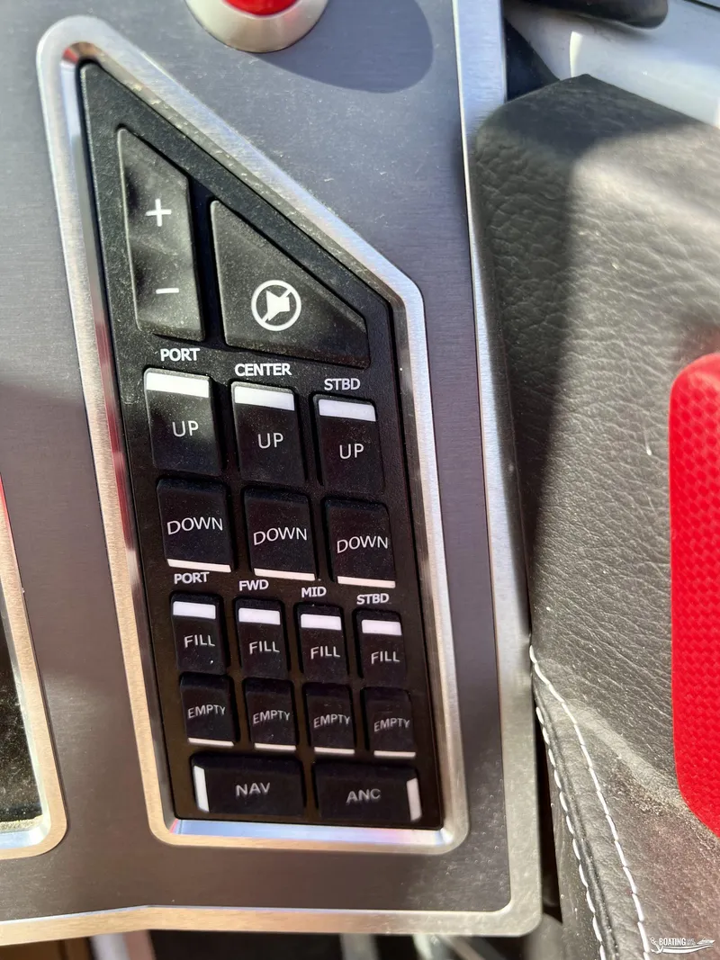 Slide: The Image of Control panel of 2023 MasterCraft X24 boat with various function buttons. - 4