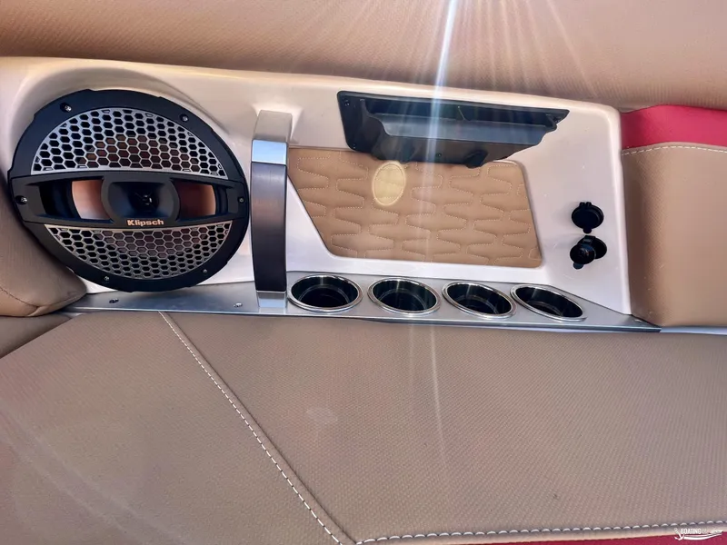 Slide: The Image of 2023 MasterCraft X24 interior with Klipsch speaker and cup holders. - 7